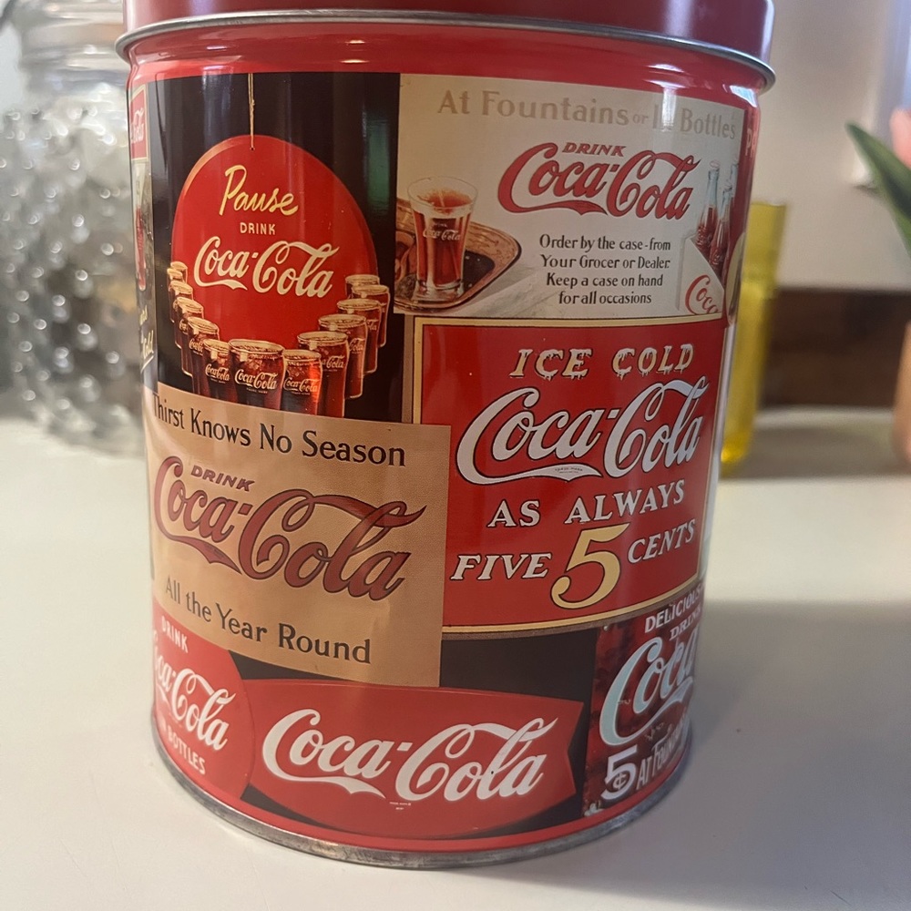 Vintage coca-cola tin with puzzle.